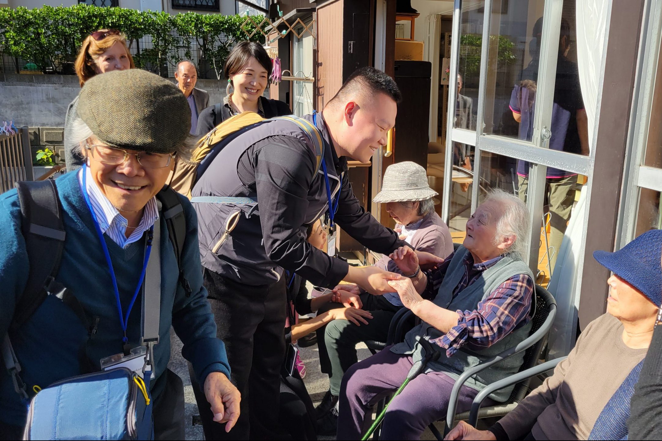 Participants chatting with older people at Imaizumi care center