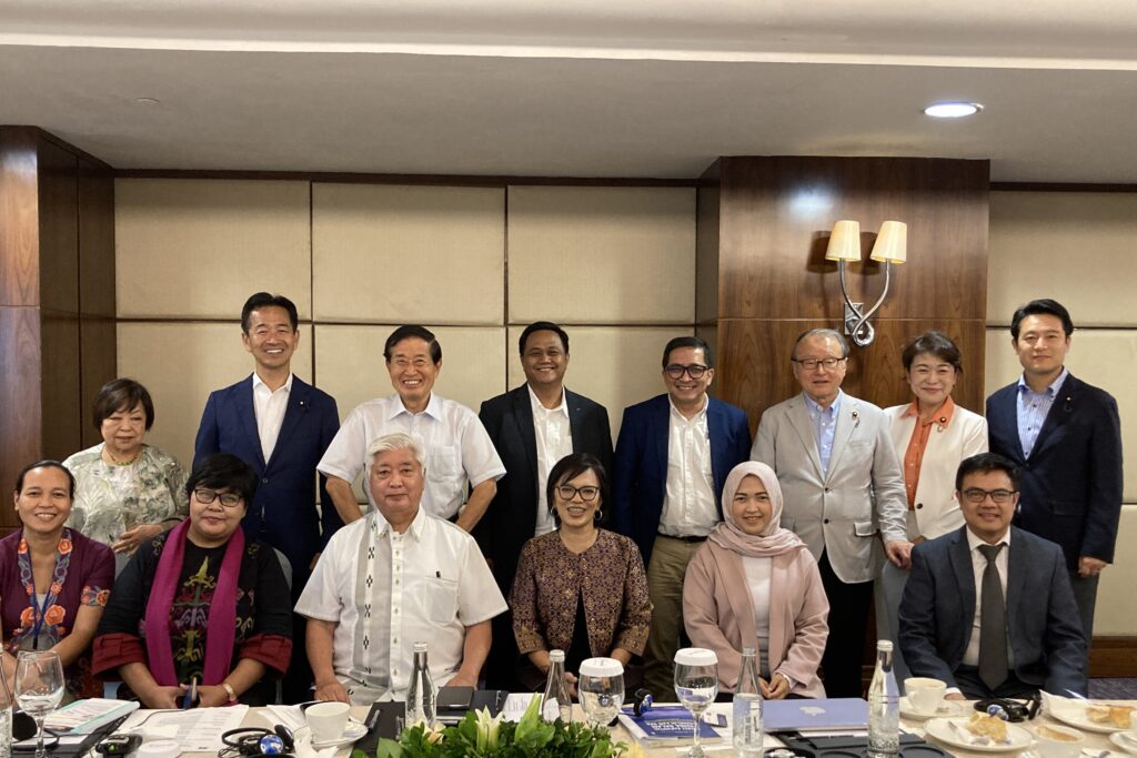 Participants during a roundtable with academics and think tank experts