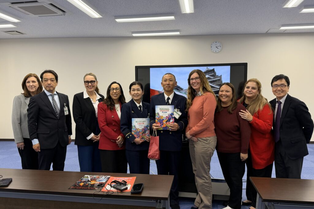 Sharing disaster prevention handbooks from San Diego with first responders in Kumamoto