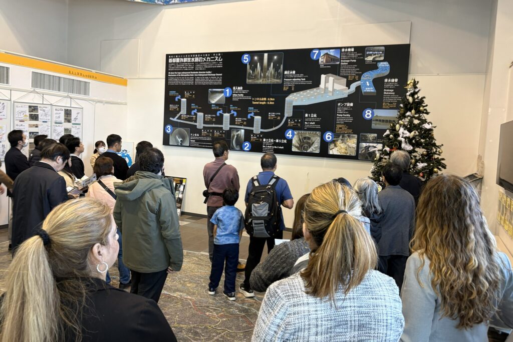 Participants being briefed on Metropolitan Area Outer Underground Discharge Channel