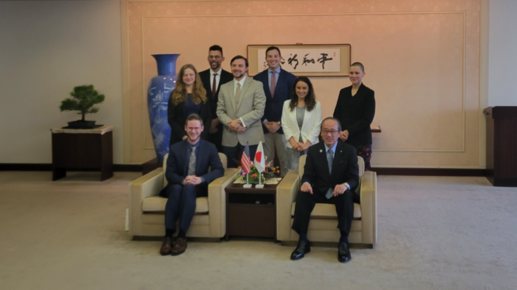 Steven representing the delegation during a meeting with Kazumi Matsui, Mayor of Hiroshima